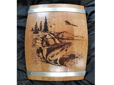 engraving image on wood barrel surface